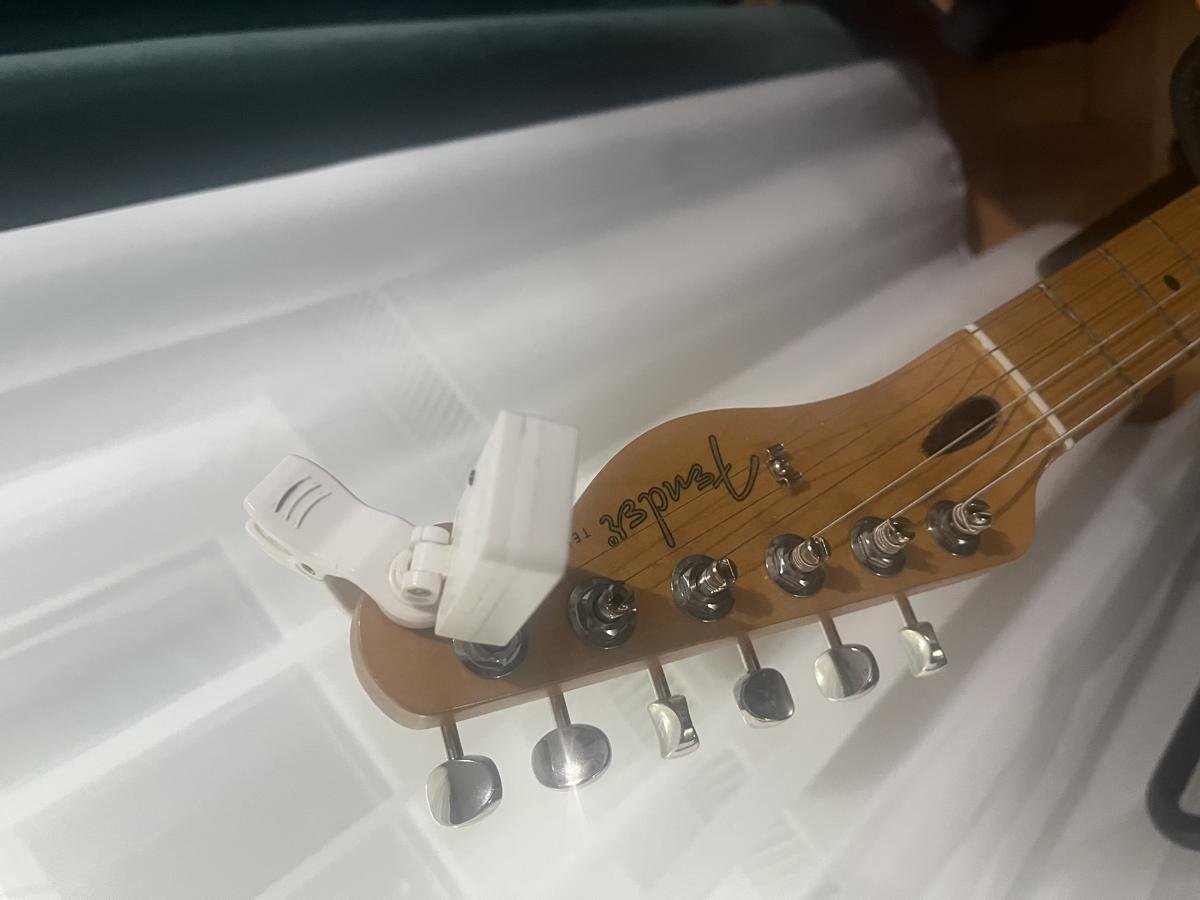 Clip-on tuner on a Fender Telecaster headstock